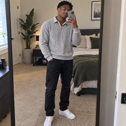 Mirror photo of the light gray Bleamme Collared Cable Quarter Zip with black jeans and white sneakers